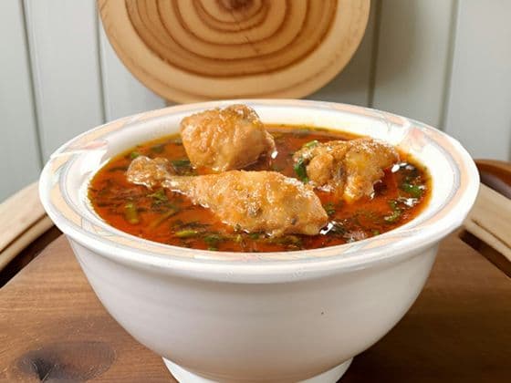 A bowl of chicken pepper soup